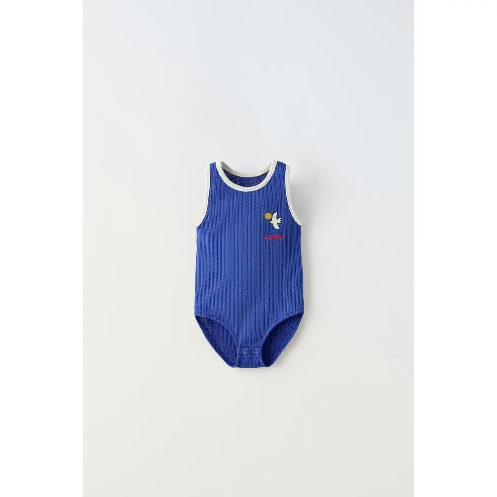 EMBROIDERED PIPED KNIT BODYSUIT
